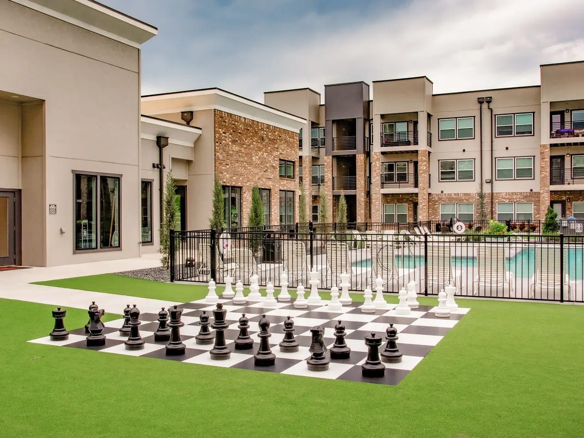 Multi-family community courtyard with pool and amenity space